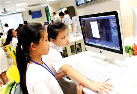A hands-on computer session at Pei Chun Public School. Provided to China Daily Program is a true learning course