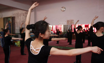 Inmates practice ballet at the Women’s Prison in Xi’an, Shaanxi province, April 25, 2011. Prison, a special place of learning