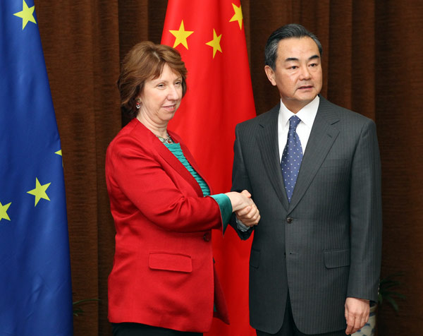 Foreign Minister Wang Yi held talks with High Representative of the European Union for Foreign Affairs and Security Policy Catherine Ashton on Saturday, to further enhance EU-China relations. Zhang Wei / China Daily  China, EU 'to renew ties'
