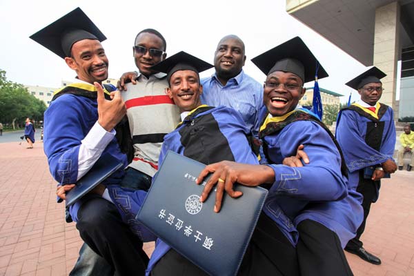 African students celebrate their graduation at Tianjin University of Technology and Education. More than 130 African students have graduated from the university since 2006. Li Xiang / Xinhua Universities seek greater enrollment from abroad
