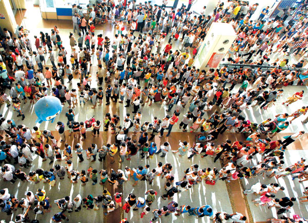 Parents wait in line at the Children’s Hospital of Fudan University, Shanghai. The plenum is expected to set an agenda that concerns the welfare of the Chinese people. Reform roadmap before key meeting