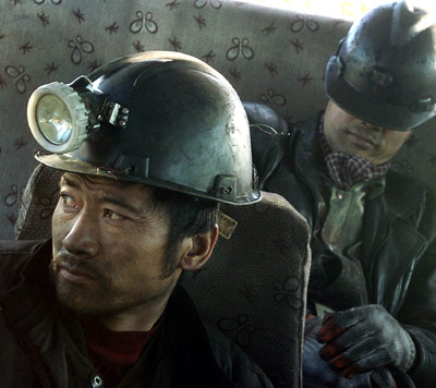 15 trapped in coal mine flooding