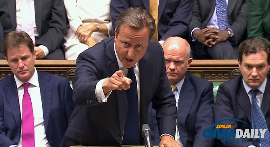 英國首相卡梅倫不敵議會反對 暫時擱置干預提議