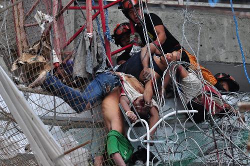 馬尼拉建筑工地電梯墜落11人喪生 事故原因或?yàn)槌d