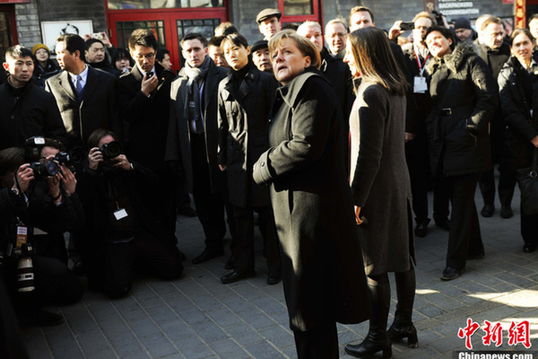 德國(guó)總理默克爾游覽北京南鑼鼓巷文化街(組圖)