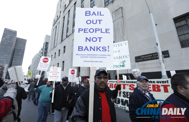 底特律破產(chǎn)案至今無解 市民游行抗議政府賴賬（圖）