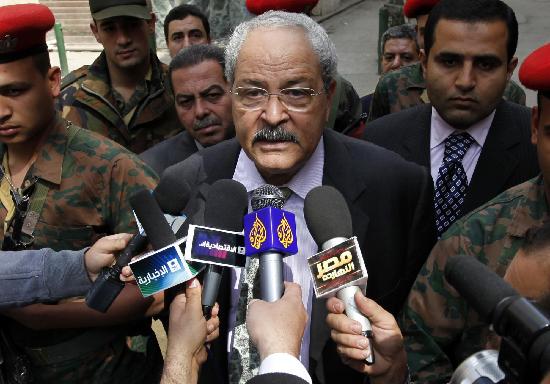Egypt's Finance Minister Samir Radwan speaks to the media as the Egyptian stock exchange celebrates its reopening, in Cairo March 23, 2011. Egypt says will not need IMF, World Bank funds