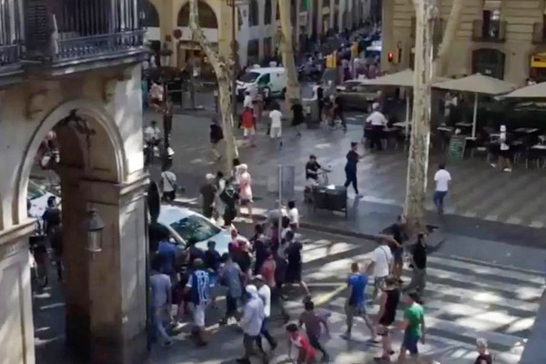 Barcelona in lockdown as police search for terrorists